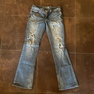 Seven jeans missing some of the rinestones but other than that great quality